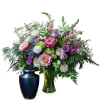Honor a live well lived with this thoughtful vased arrangement of pink