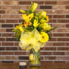 Mixture of yellow gerbers, lilies, daisies, solidago