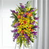 Our Thoughtful Prayers Standing Spray beautifully remembers their passion and radiance within