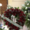 Beautiful red roses and gerberas with touch of greens and baby breath