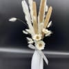 This gem is made with dry standing real flower sitting in a