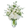 This lush and lovely combination of roses and hydrangea is purely elegant.
