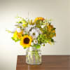A white and yellow bouquet perfect for a birthday. From $70.