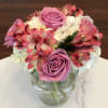 Hydrangea, roses and alstroemeria are perfectly combined to create this classic style.