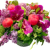 The Capri Flower Arrangement is a rich and colorful bouquet, bursting with