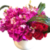The Chelsea Arrangement is a hot pink and red flower arrangement that&rsquo;s