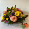 Our cornucopia beautifully captures the harvest season. Crafted from fresh-cut, fragrant evergreens