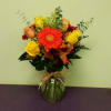 This arrangement is truly stunning. The bold colors that represent the fall