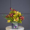 A pretty design including cymbidium orchids and accents in a nice container.
STANDARD: