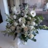Beautiful al white funeral basket in deepest sympathy 