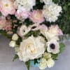 This perfect gift has some gorgeous white flowers, white hydrangea, white roses