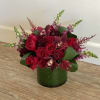 This arrangement is full of deep rich reds with lots of texture.