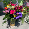 This beautiful arrangement has gorgeous colors and the combination of colors is