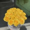 This gorgeous box arrangement has yellow bright roses a perfect gift to