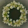 A lovely Classic Elegant tribute of purity and light.
This wreath contains roses