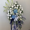 A beautiful blue and white spray, an ethereal glow much like the