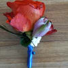 Bright, whimsical colors groom&#039;s boutonniere 