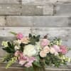 Our designers will carefully curate sweetly soft toned seasonal florals &amp; fillers