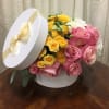 This sweet bouquet includes a vast array of pink and white roses