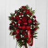 &quot;The FTD Treasured Memories Standing Spray is a rich and colorful 
way