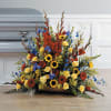 Gerber Daisies, gladiola Iris, Delphinium, roses sunflowers and solidago