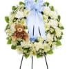 Send this all-white floral display to express your deepest sympathies of the