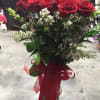 18 Red Rose Extra Fancy in a vase with greens