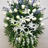 CLEAR BLUE SKIES STANDING SPRAY BY TWIN TOWERS FLORIST IN ARLINGTON, VA