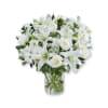 Express your sincere condolences with our elegant all-white arrangement of roses, lilies
