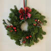 Deck the halls in classic Christmas style! Our traditional wreath is crafted