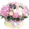 Hat box style with mixed seasonal flowers