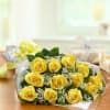 A timeless classic! A dozen loose roses arranged beautifully with gypsophila and
