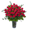 This awesome arrangement of red roses will fill your room with grace