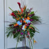 A beautiful cross tribute designed with tropical flowers. Can be customized in