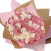 Pink and white Ecuadorian long stem roses in our luxury wrap