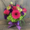 This beautiful Jewl toned floral arrangement includes Roses, Hydrangea, Lisianthius, Veronica, and