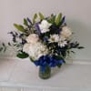 Beautiful mix of white roses, daisies, carnations, hydrangea &amp; navy/blue irises, statice