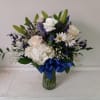 Beautiful mix of white roses, daisies, carnations, hydrangea &amp; navy/blue irises, statice