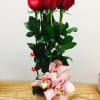 Half dozen red roses and orchids decorated with crystal flowers in a
