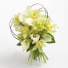 A work of art. This serene sculpture of green orchids, crystal callas