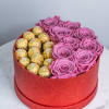 Everlastng roses and sweets in an elegant box. They will complement a