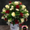 Red and white rose top hat Arrangement. Very popular year round. Filled