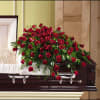 Orchids  florist in Waterbury 
A richly designed floral casket arrangement of