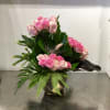 Custom arrangement of pale pink &amp; pink roses with exotic foliage in