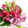 This unique arrangement is simplistic elegance with a contemporary flair. Asymmetrically placed