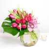 This unique arrangement is simplistic elegance with a contemporary flair. Asymmetrically placed