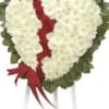 Our Broken Heart Standing Spray includes a display white flowers in a