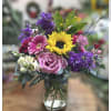 A beautiful bouquet of blooms that evokes a big smile! This arrangement