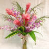 This lavish tropical flower display is artfully arranged in our popular &quot;diva&quot;
