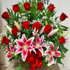 This beautiful arrangement comes with 12 roses with stargazer lilies.